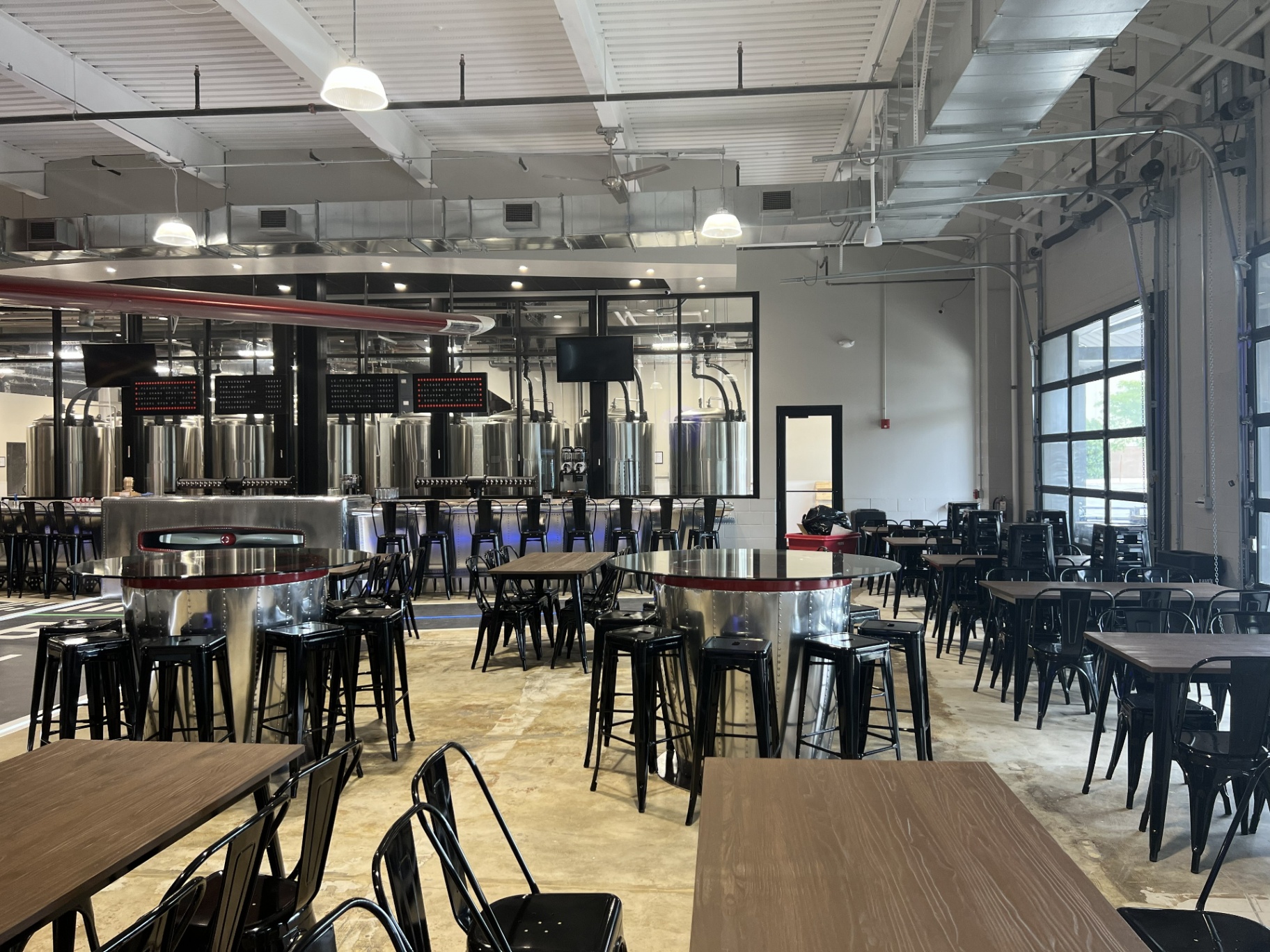 Bonesaw Brewing Deptford — glass-walled brewhouse and overhead doors