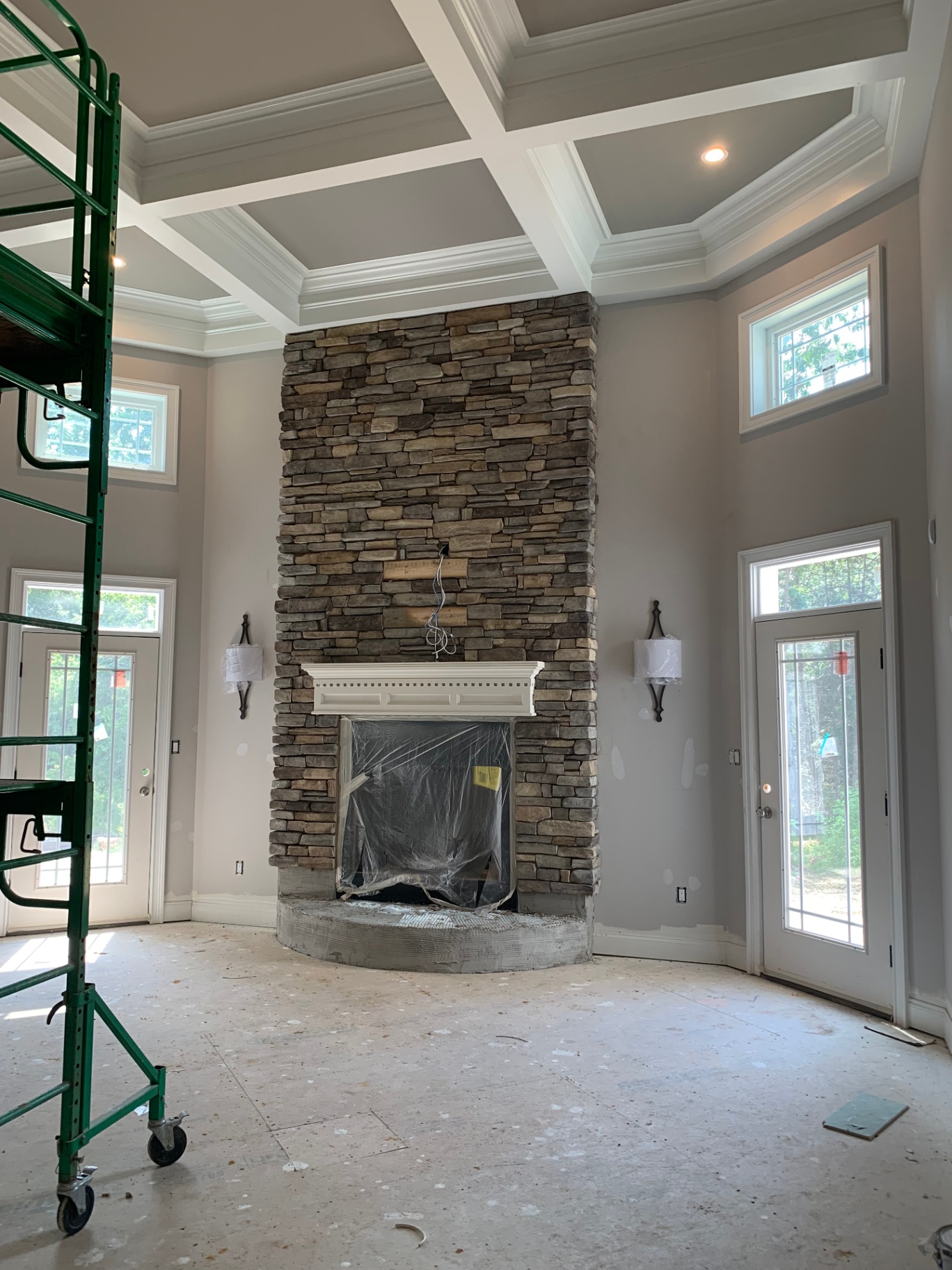 Mullica Hill Residence — two-story stone fireplace and coffered ceiling
