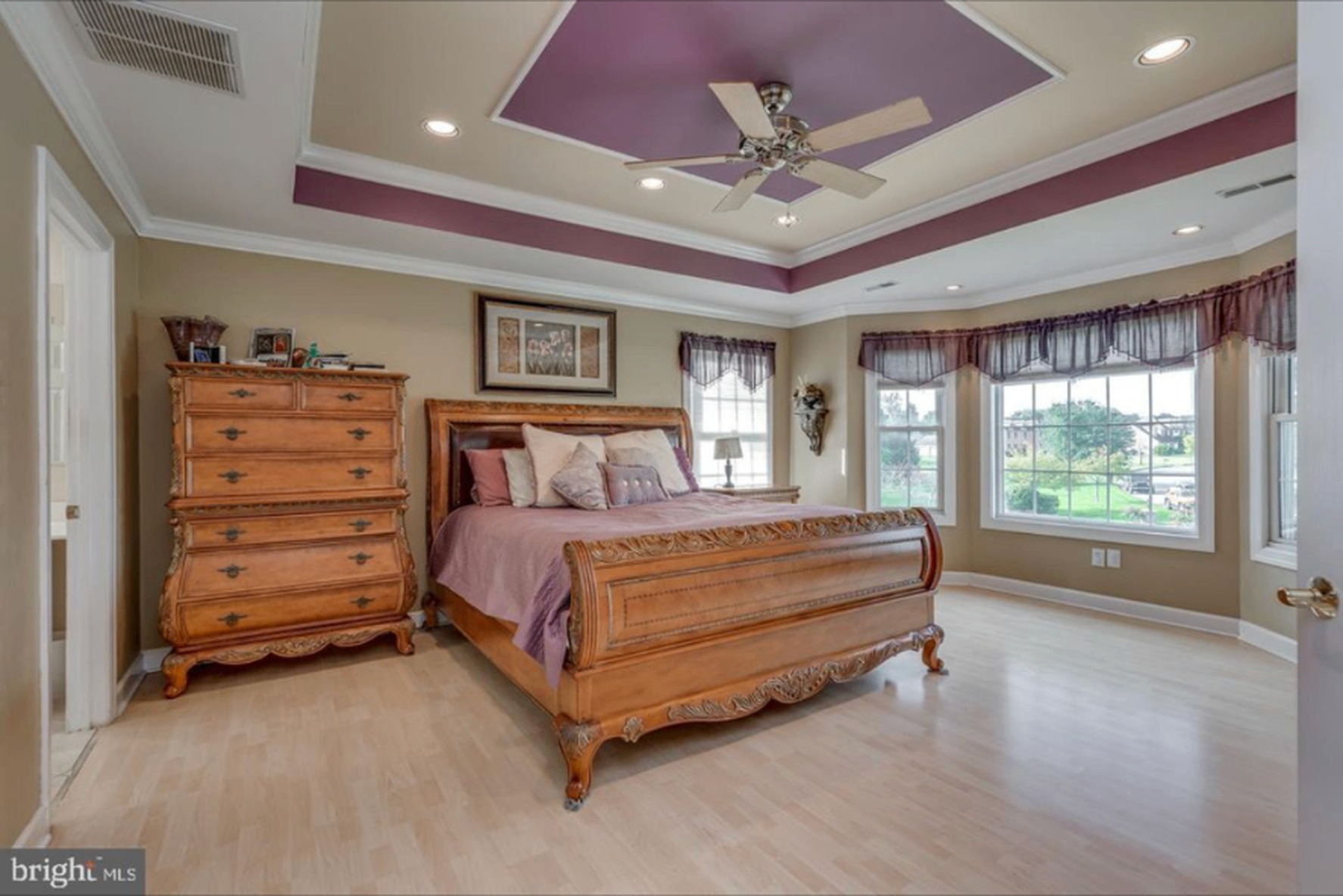 South Harrison Residence II — primary bedroom with tray ceiling