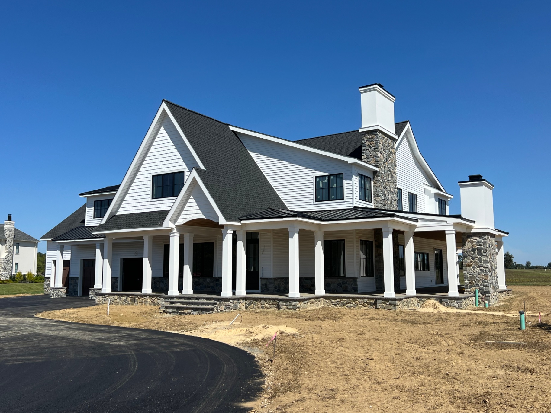 Woodstown Residence II — corner view of the wraparound porch