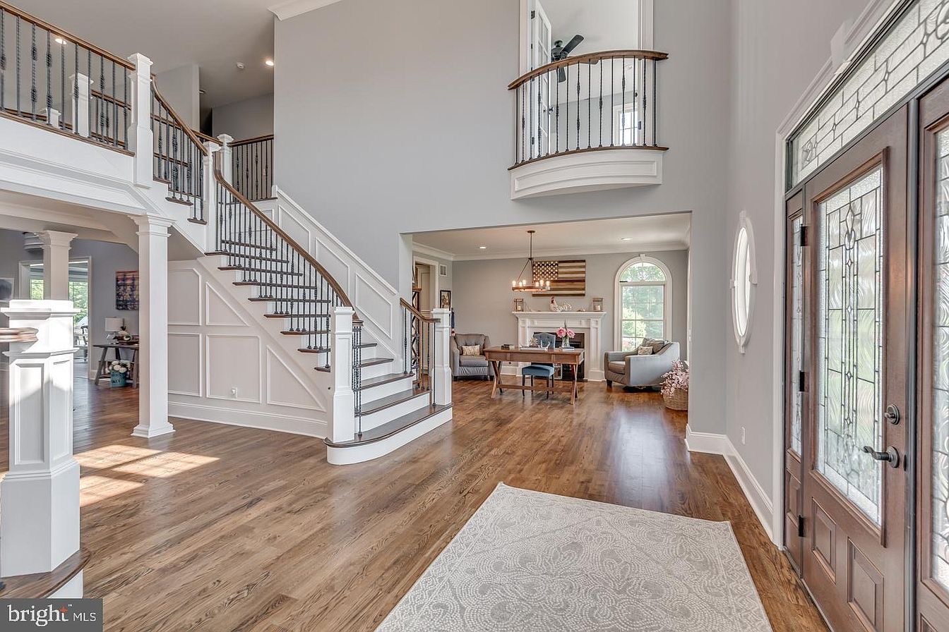 South Harrison Residence — curved stair and study beyond