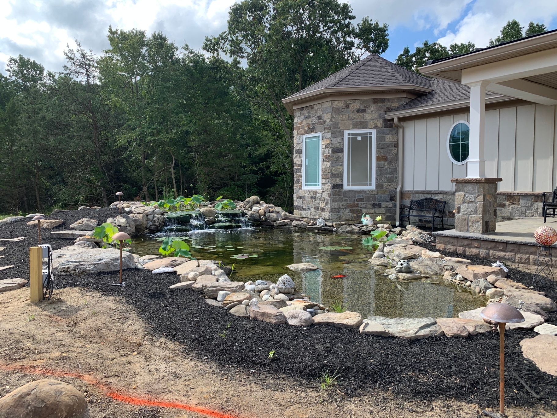 Mullica Hill Residence — water feature and stone turret bay