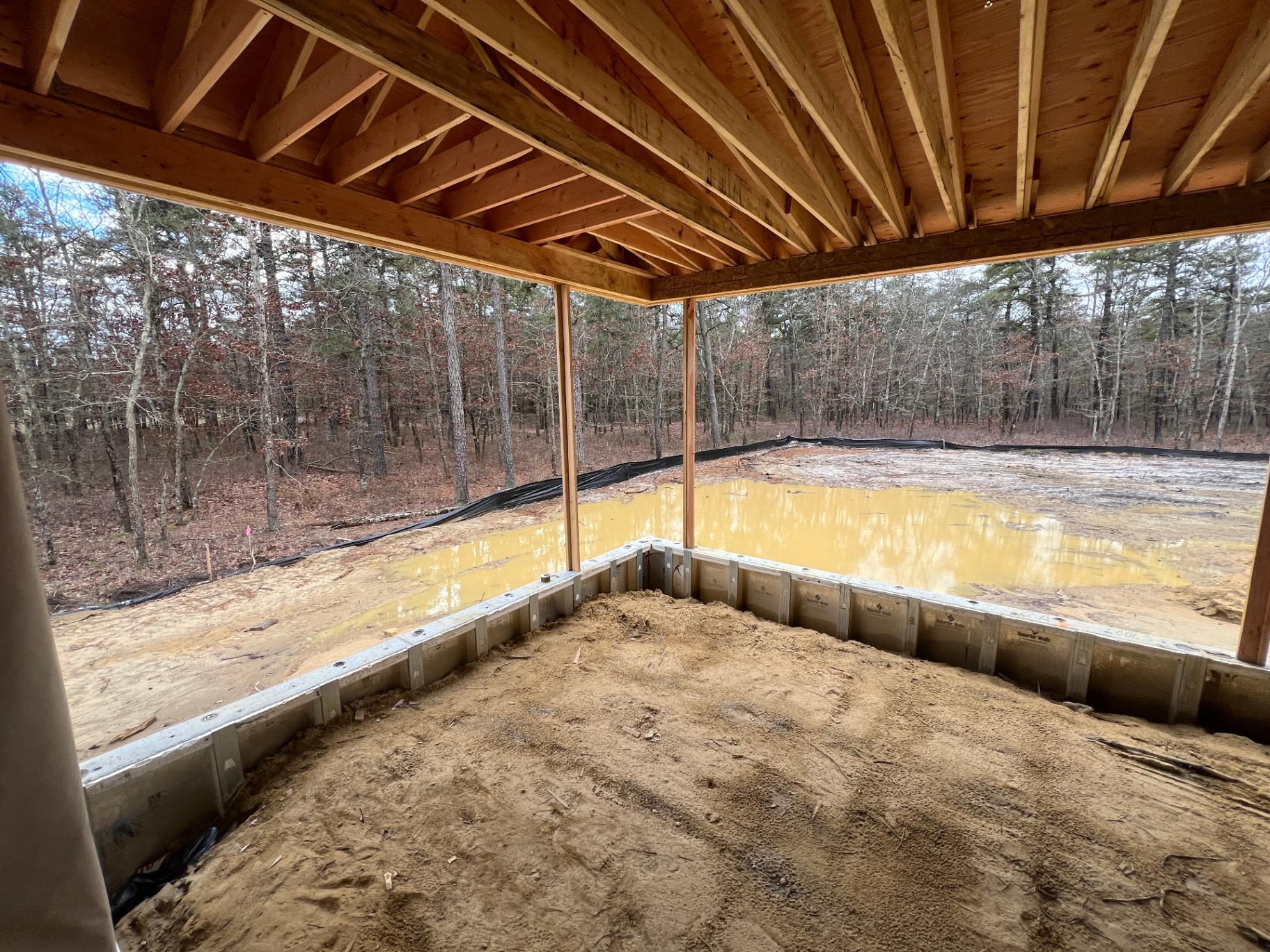 Shamong Residence — covered rear porch framing overlooking the woods