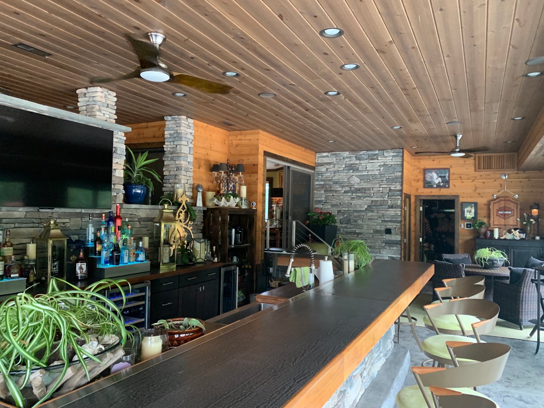 Moorestown Custom Addition — stacked-stone bar wall