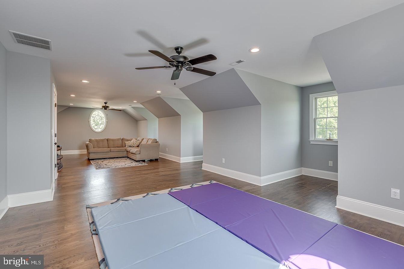South Harrison Residence — upper-level bonus room with dormers